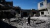 Funérailles massives de loyalistes tués dans un attentat en Syrie