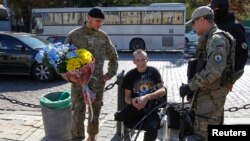 Бійці добровольчого батальйона "Азов", які повернулися з фронту