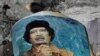 Gadhafi đền tội và một bài báo ca ngợi ông ta đến tuyệt đỉnh