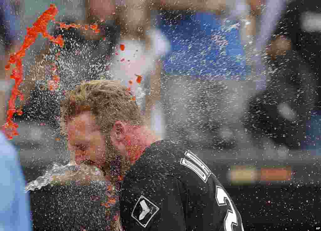 Chicago White Sox's Matt Davidson celebrates after hitting a walkoff home run against the Detroit Tigers during the ninth inning of a baseball game in Chicago, Illinois, Sept. 3, 2018.