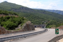 FILE - The Bar-Boljare highway is seen in the village Pelev Brijeg, Montenegro, May 27, 2021. A Chinese loan for the first phase of a highway linking the Adriatic Sea port of Bar and border with Serbia has sent Montenegro's debt soaring.