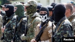 Pripadnici separatističkih snaga na istoku Ukrajini