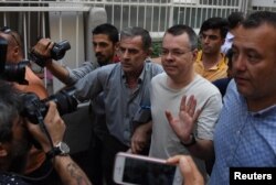 U.S. pastor Andrew Brunson reacts as he arrives at his home after being released from the prison in Izmir, Turkey, July 25, 2018.