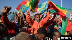 Ethiopian Prime Minister Abiy Ahmed's backers rally to denounce what the organizers say is the Tigray People’s Liberation Front and the Western countries' interference in the country's internal affairs, at Meskel Square in Addis Abba, Ethiopia, Nov. 7, 2021.