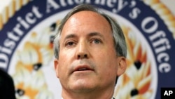 FILE - In this June 22, 2017, photo, Texas Attorney General Ken Paxton speaks at a news conference in Dallas.