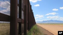 Part of the border fence near Naco, Arizona, is seen in this Sept. 16, 2015 file photo.