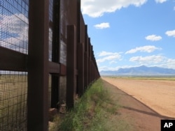 Part of the border fence near Naco, Arizona, is seen in this Sept. 16, 2015 file photo.