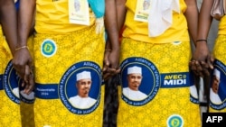 Supporters wearing loincloths bearing the effigy of Chadian President Mahamat Idriss Deby Itno gather at a Patriotic Salvation Movement (MPS) campaign meeting in the Sabangali district of N'Djamena, on Dec. 14, 2024.