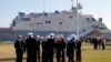 Члени екіпажу бойового корабля USS Sioux City у Військово-морській академії США в Аннаполісі, штат Меріленд. AP Photo/Patrick Semansky