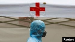 A medical specialist is seen at a makeshift rapid testing center for coronavirus disease, in Hanoi, Vietnam, March 31, 2020. The U.S. has provided emergency assistance to the 10-member Association of Southeast Asian Nations (ASEAN) to fight the pandemic.