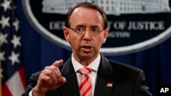 FILE - Deputy Attorney General Rod Rosenstein speaks during a news conference at the Department of Justice.