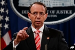 FILE - Deputy Attorney General Rod Rosenstein speaks during a news conference at the Department of Justice.