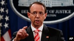 FILE - Deputy Attorney General Rod Rosenstein speaks during a news conference at the Department of Justice in Washington, July 13, 2018.