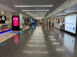 Rome’s airport remains deserted and silent. (Jamie Dettmer/VOA)