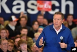 FILE - Republican presidential candidate, Ohio Gov. John Kasich speaks at a rally in Traverse City, Mich., March 5, 2016.