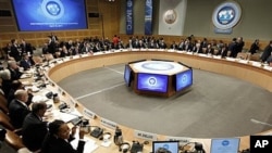 Delegates of the International Monetary and Financial Committee (IMFC) gather at the spring meetings of the IMF/World Bank in Washington, April 16, 2011