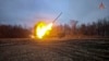 In this photo taken from a video distributed by Russian Defense Ministry Press Service on Feb. 6, 2025, a Russian self-propelled multiple rocket launcher is fired toward a Ukrainian position at an undisclosed location in the Kursk region border area. 