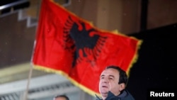 Vetevendosje (Self-determination) party leader Albin Kurti speaks during a news conference after preliminary results of the parliamentary election in Pristina, Kosovo, Feb. 14, 2021.