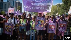 FILE — Zackie Achmat(C) an openly gay veteran activist, who is standing as an independent candidate in the upcoming general elections, joins thousands of people, many in colorful outfits, take part in the annual Cape Town Pride Parade on March 02, 2024, in Cape Town.