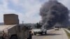 Dema hêzên Sûrî di wesayîtekê de, dijî serhildaneke nû ya ji alîyê çekdarên Elewî şer dikin, Lazqîyê, Sûrîyê 7ê Adar, 2025.