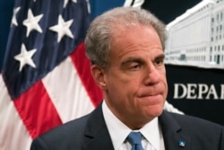 Justice Department Inspector General Michael Horowitz appears at the launch of the Procurement Collusion Strike Force at the Justice Department in Washington, Nov. 5, 2019.