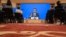 FILE - Chinese Premier Li Keqiang speaks on screen during a press conference by video conferencing at the end of the National People's Congress in Beijing, May 28, 2020. 