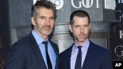 Creator/executive producers David Benioff, left, and D. B. Weiss attend HBO's "Game of Thrones" final season premiere at Radio City Music Hall on April 3, 2019, in New York. 