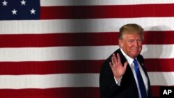 Republican presidential candidate, Donald Trump, waves during a campaign event in Lawrenceville, N.J., May 19, 2016.