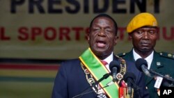 Zimbabwe's President Emmerson Mnangagwa speaks after being sworn in at the presidential inauguration ceremony in the capital Harare, Zimbabwe, Nov. 24, 2017.