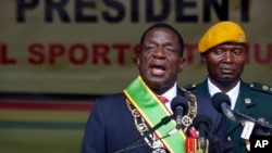 Zimbabwe's President Emmerson Mnangagwa speaks after being sworn in at the presidential inauguration ceremony in the capital Harare, Zimbabwe, Nov. 24, 2017.