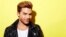 Singer, songwriter and runner-up finalist on "American Idol" Adam Lambert poses for a portrait in promotion of his upcoming album "Original High," May 19, 2015, in New York.