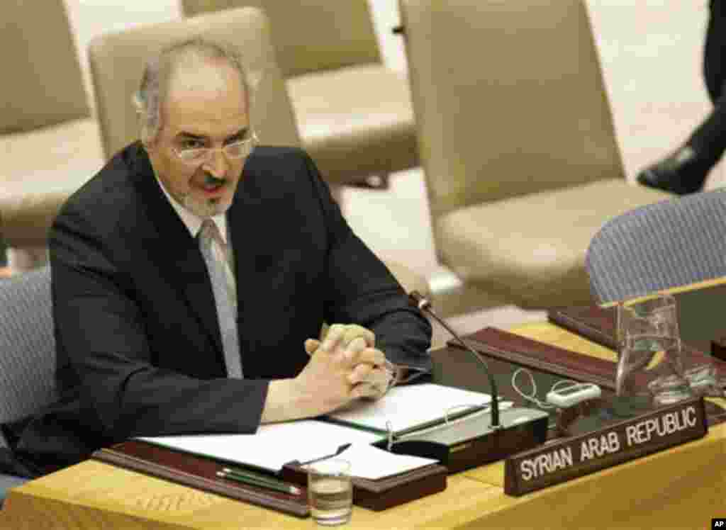 Syria's UN Ambassador Bashar Ja'afari speaks during a Security Council meeting on the situation in Syria at the United Nations, Thursday, July 19, 2012. (AP Photo/Kathy Willens)