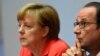 عکس آرشیوی از آنگلا مرکل صدر اعظم آلمان (چپ) و فرانسوا اولاند رئیس جمهوری فرانسه در کنفرانسی در برلین آلمان - ۲۹ اردیبهشت ۱۳۹۴ 