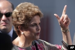 FILE - Brazil’s President Dilma Rousseff speaks during a visit to ground infrastructure works for Geostationary Satellite Operation Defense and Strategic Communications for the 2016 Olympic Games, in Brasilia, Brazil, March 23, 2016.
