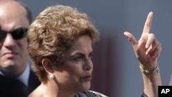La Président Dilma Rousseff du Brésil parle lors d'une visite à Brasilia , au Brésil , le 23 Mars , ici 2016.
