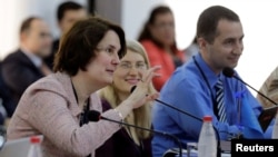 FILE - European Union Chief Negotiator for Mercosur Sandra Gallina gestures during a meeting with negotiators of the Latin American bloc Mercosur to continue discussions on a free trade deal, in Luque, Paraguay, Feb. 21, 2018.