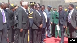 President Robert Mugabe and some senior state officials.