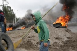Protesters bock a highway in Pastocalle, Ecuador, Oct. 6, 2019.