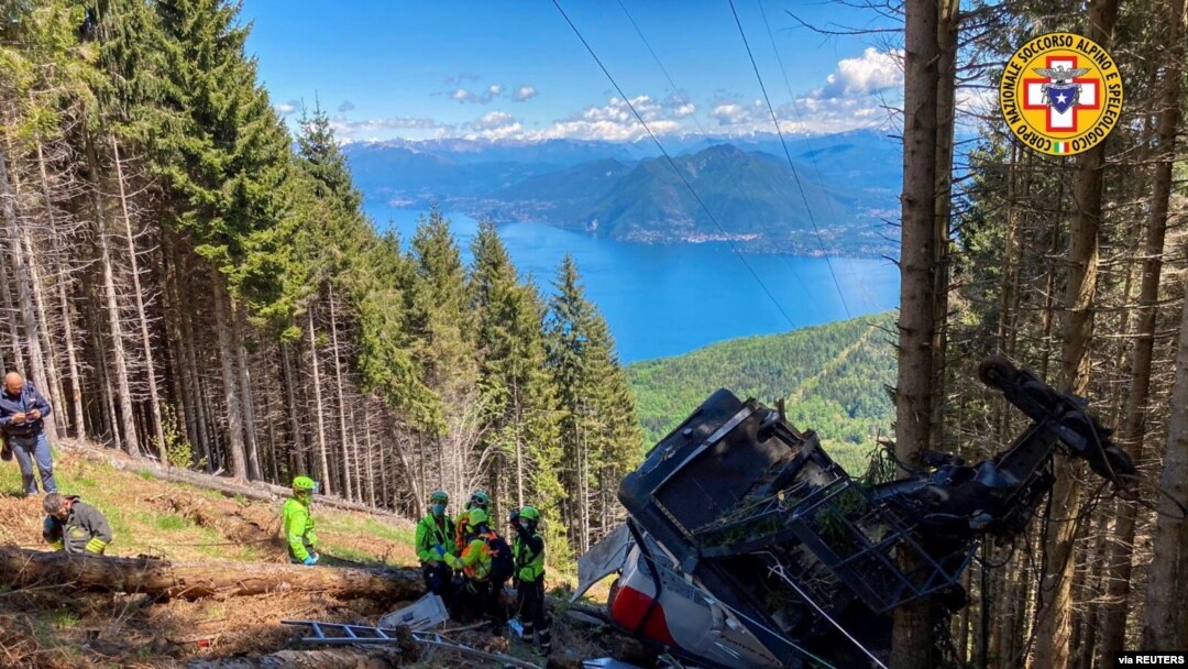A crashed cable car is seen after it fell, possibly due to a ruptured cable, in Stresa, near Lake Maggiore, Italy, May 23, 2021. (Alpine Rescue Service/Handout)
