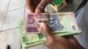 Zimbabwe’s Businesses Want Dollars, Not ‘Bond Notes’