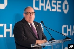 FILE - Maryland Gov. Larry Hogan speaks at a luncheon in Washington, April 19, 2018.