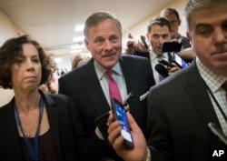 Reporters interview Senate Select Committee on Intelligence Chairman Sen. Richard Burr, R-N.C., the morning after President Donald Trump fired FBI Director James Comey, on Capitol Hill in Washington, May 10, 2017.
