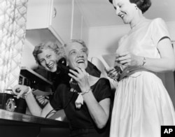 Sen. Margaret Chase Smith makes calls to friends from her home in Skohegan, Maine in this June 21, 1954 file photo. (AP)