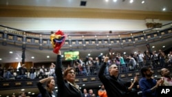 Anti-government lawmakers shout "Fraud," during a session of Venezuela's National Assembly, in Caracas, Venezuela, Aug. 2, 2017. 