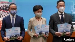 香港特首林郑月娥与官员星期二加入记者会宣布改变香港选举制度