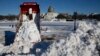 عملیات برف روبی در خیابان های شهر واشنگتن پایتخت ایالات متحده همچنان ادامه دارد