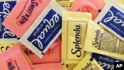 FILE: Artificial sweeteners are displayed, on Wednesday, Sept. 17, 2014, in New York.