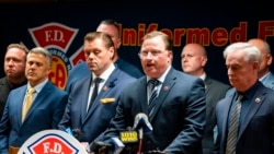 Andrew Ansbro, FDNY Uniformed Firefighters Association president, speaks during a news conference to address a new COVID-19 vaccine mandate, Oct. 20, 2021, in New York. The organization says COVID-19 vaccinations should be voluntary.