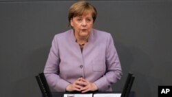 German Chancellor Angela Merkel delivers her speech about the European Union at the German parliament Bundestag in Berlin, April 27, 2017. 