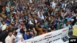 FILE - Pakistani activists of the Pashtun Tahaffuz Movement take part in a protest in Karachi on Jan. 23, 2019.